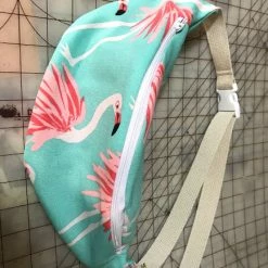 Tidal Cool Flamingo Print Canvas Hip Bag In Turquoise And Pink