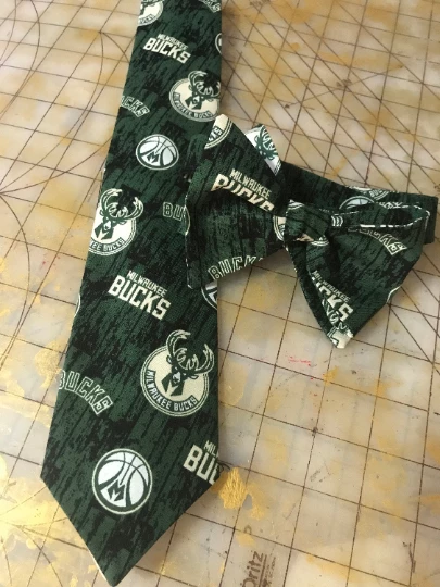 Tidal Cool Milwaukee Bucks NBA Neckties In Bow Tie, Skinny Tie, And Standard Tie Styles, Kids Or Adult Sizes Neckties, Vests, Pocket Squares And Cummerbunds