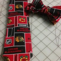Tidal Cool Neckties, Vests, Pocket Squares And Cummerbunds Chicago Blackhawks NHL Neckties In Bow Tie, Skinny Tie, And Standard Tie Styles, Kids Or Adult Sizes