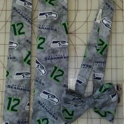 Tidal Cool Seattle Seahawks 12th Man NFL Neckties In Bow Tie, Skinny Tie, And Standard Tie Styles, Kids Or Adult Sizes Neckties, Vests, Pocket Squares And Cummerbunds