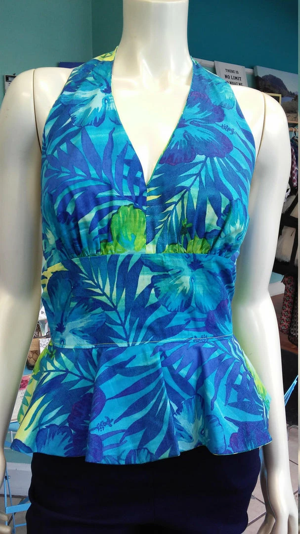 Tidal Cool Hawaiian Print Pinup Halter In Blue And Green Floral Print And Peplum Ruffle