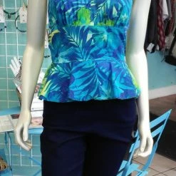 Tidal Cool Hawaiian Print Pinup Halter In Blue And Green Floral Print And Peplum Ruffle