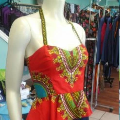 Tidal Cool Reversible Pin Up Halter With Fitted Bodice And Flirty Peplum In Red African Dashiki Print Neckties, Vests, Pocket Squares And Cummerbunds