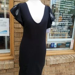 Tidal Cool Black Stretch Knit Dress With Flutter Sleeves And Fitted Shape Dresses