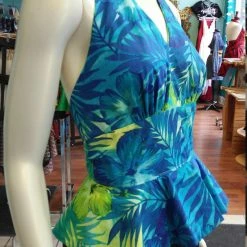 Tidal Cool Hawaiian Print Pinup Halter In Blue And Green Floral Print And Peplum Ruffle