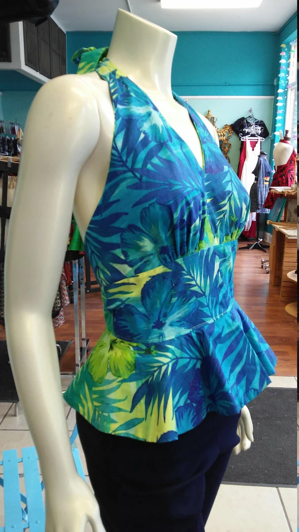 Tidal Cool Hawaiian Print Pinup Halter In Blue And Green Floral Print And Peplum Ruffle