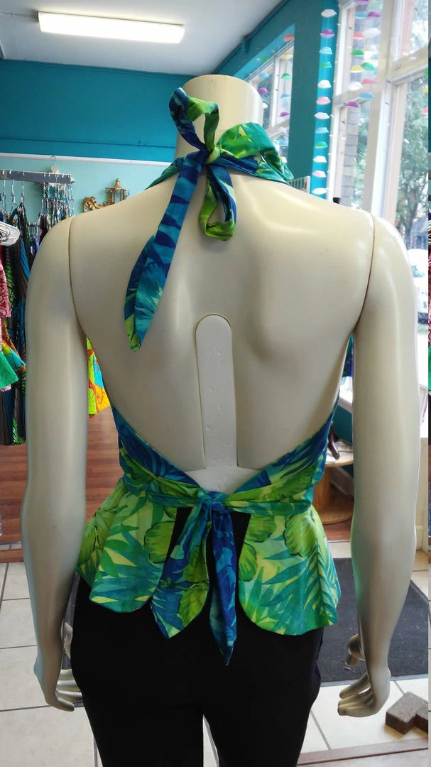 Tidal Cool Hawaiian Print Pinup Halter In Blue And Green Floral Print And Peplum Ruffle