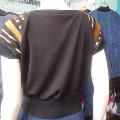 Tidal Cool Black Knit Shirt With African Mud Cloth Raglan Sleeves And Cuffs