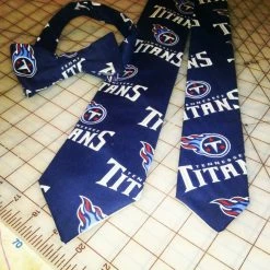 Tidal Cool Tennessee Titans NFL Neckties In Bow Tie, Skinny Tie, And Standard Tie Styles, Kids Or Adult Sizes Neckties, Vests, Pocket Squares And Cummerbunds