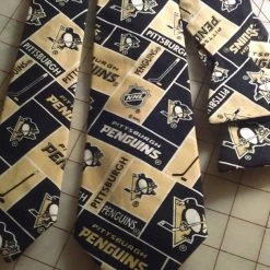 Tidal Cool Pittsburgh Penguins NHL Neckties In Bow Tie, Skinny Tie, And Standard Tie Styles, Kids Or Adult Sizes Neckties, Vests, Pocket Squares And Cummerbunds
