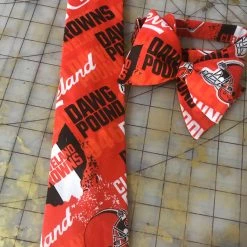 Tidal Cool Cleveland Browns NFL Neckties In Bow Tie, Skinny Tie, And Standard Tie Styles, Kids Or Adult Sizes Neckties, Vests, Pocket Squares And Cummerbunds